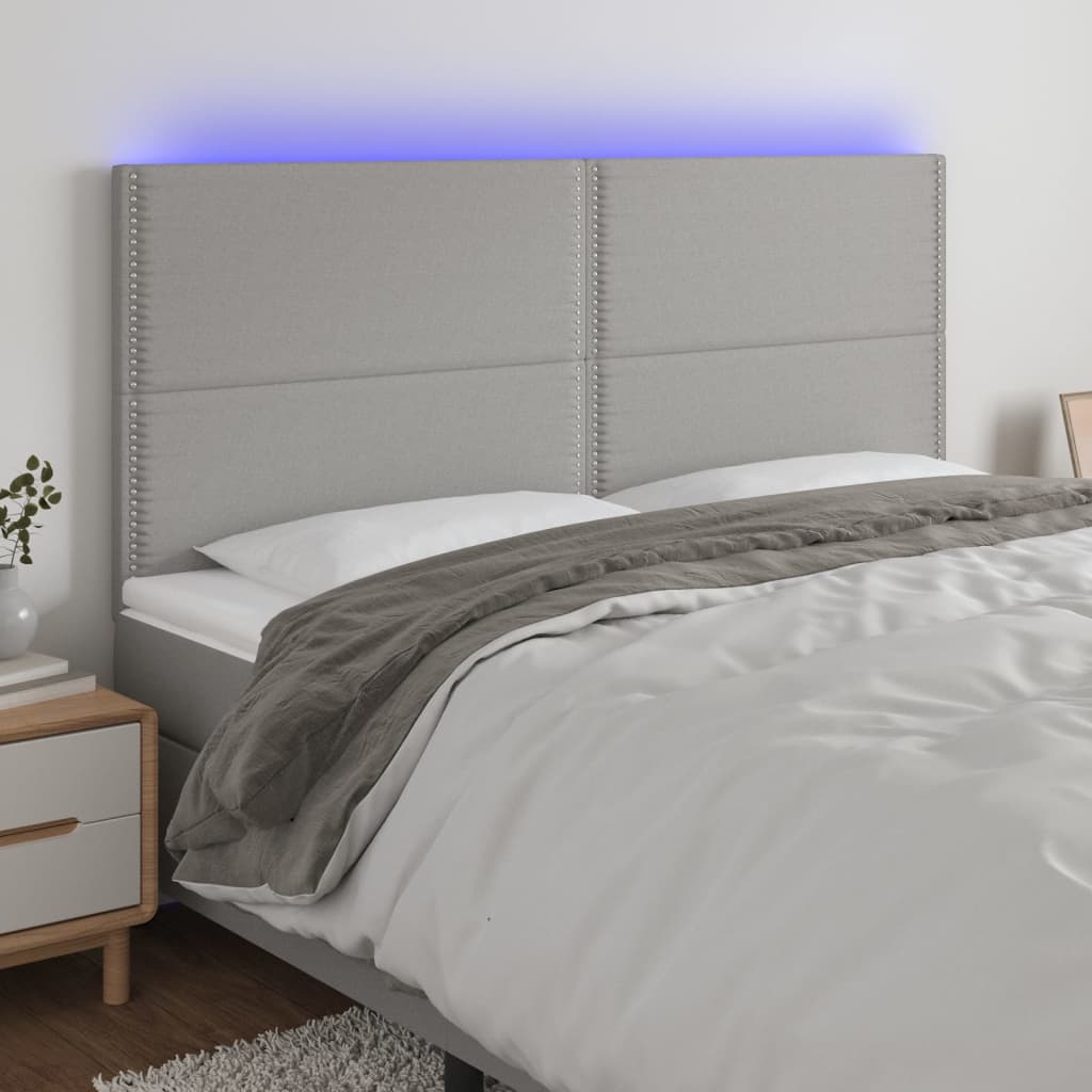 vidaXL Zagłówek do łóżka z LED, jasnoszary, 160x5x118/128 cm, tkanina