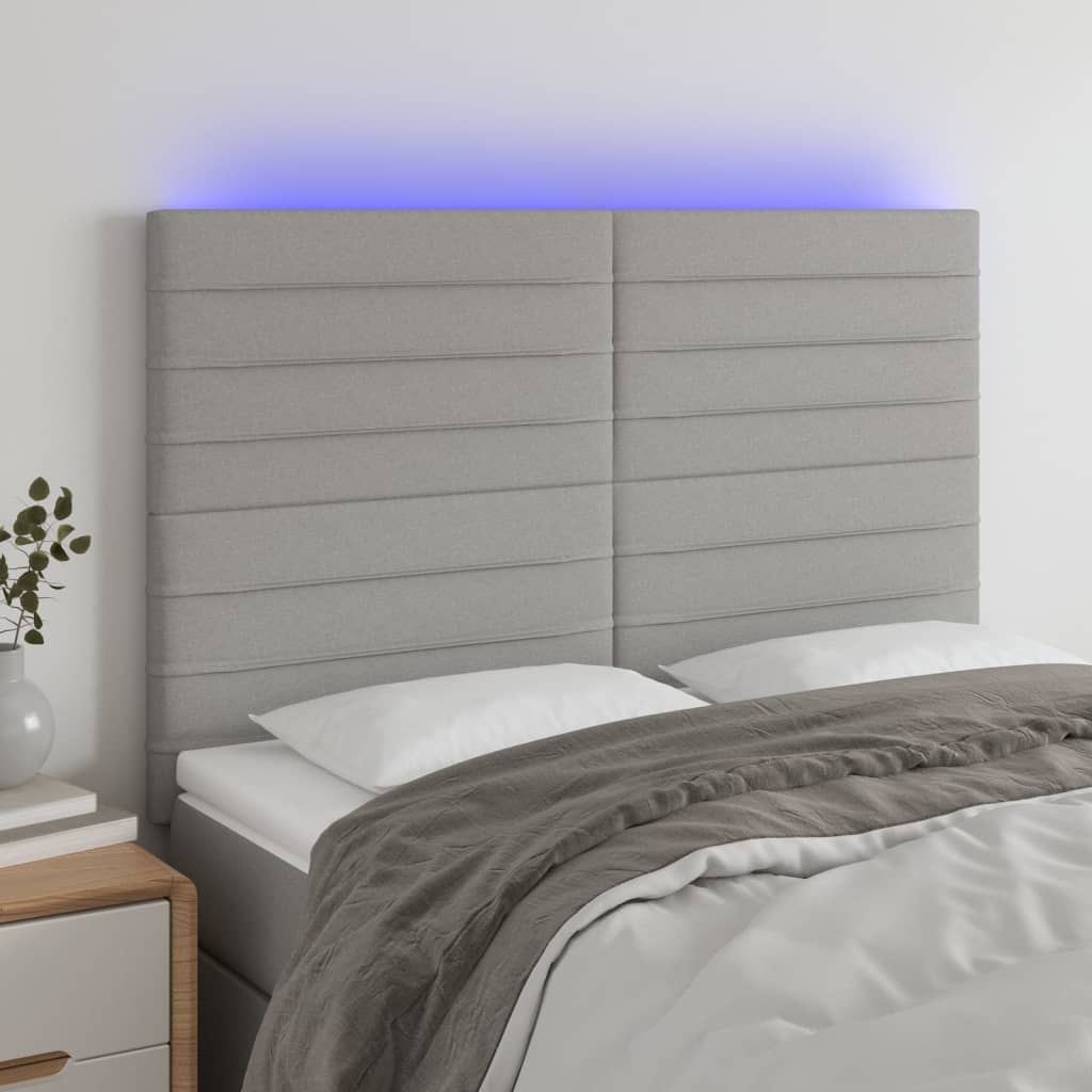 vidaXL Zagłówek do łóżka z LED, jasnoszary, 144x5x118/128 cm, tkanina