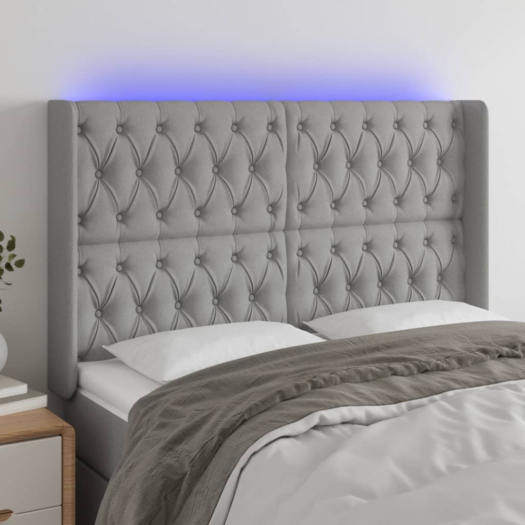 vidaXL Zagłówek do łóżka z LED, jasnoszary, 163x16x118/128 cm, tkanina