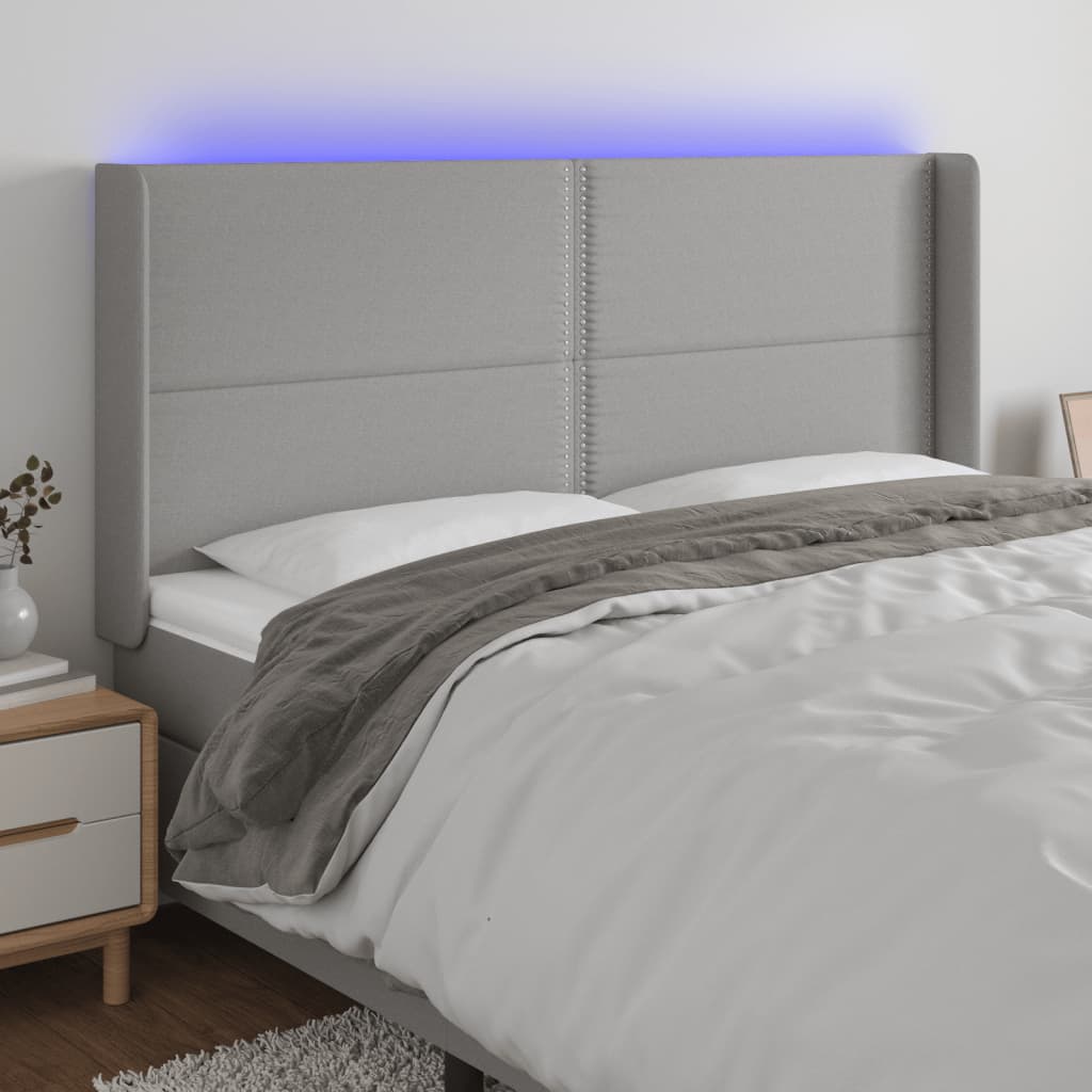 vidaXL Zagłówek do łóżka z LED, jasnoszary, 203x16x118/128 cm, tkanina
