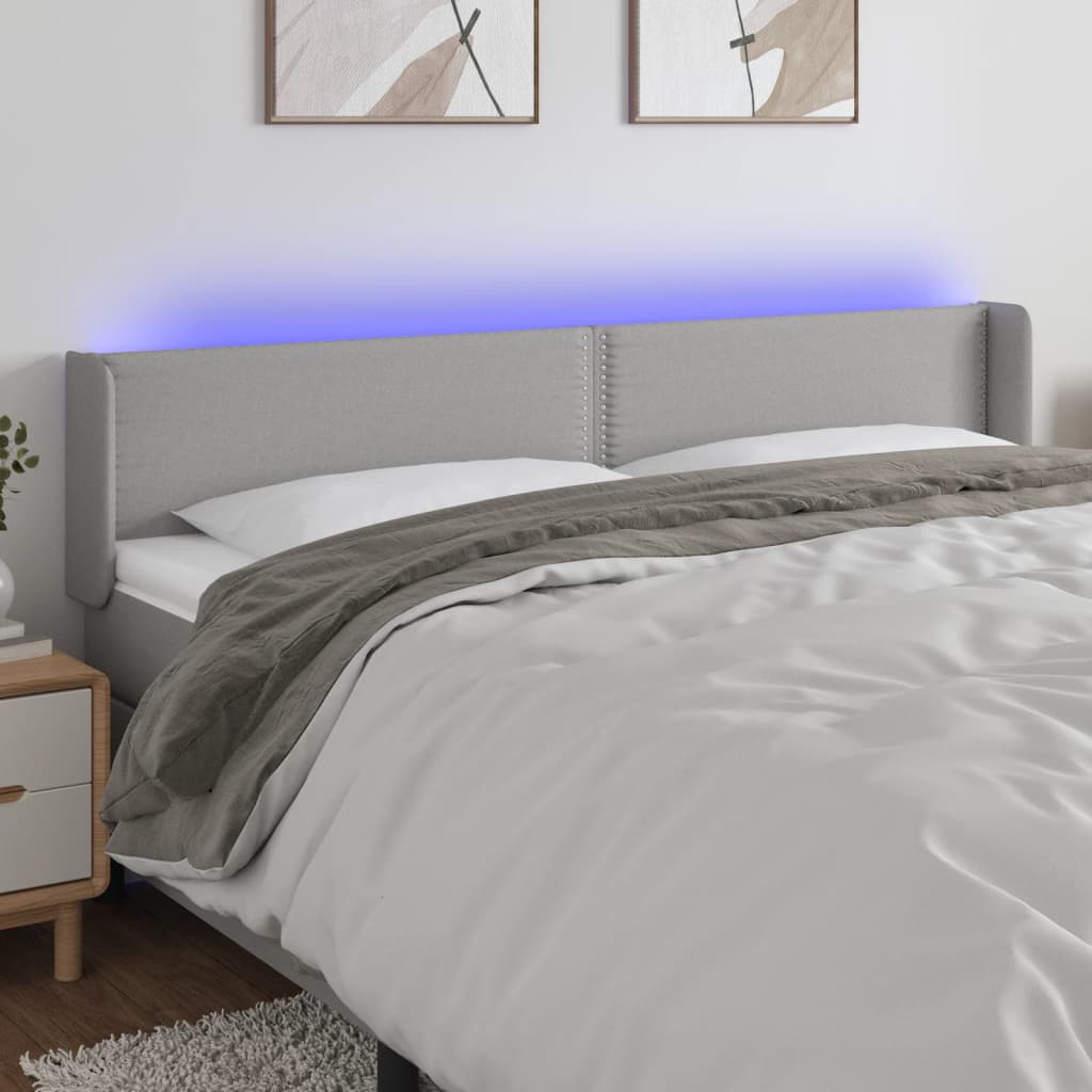 vidaXL Zagłówek do łóżka z LED, jasnoszary, 203x16x78/88 cm, tkanina