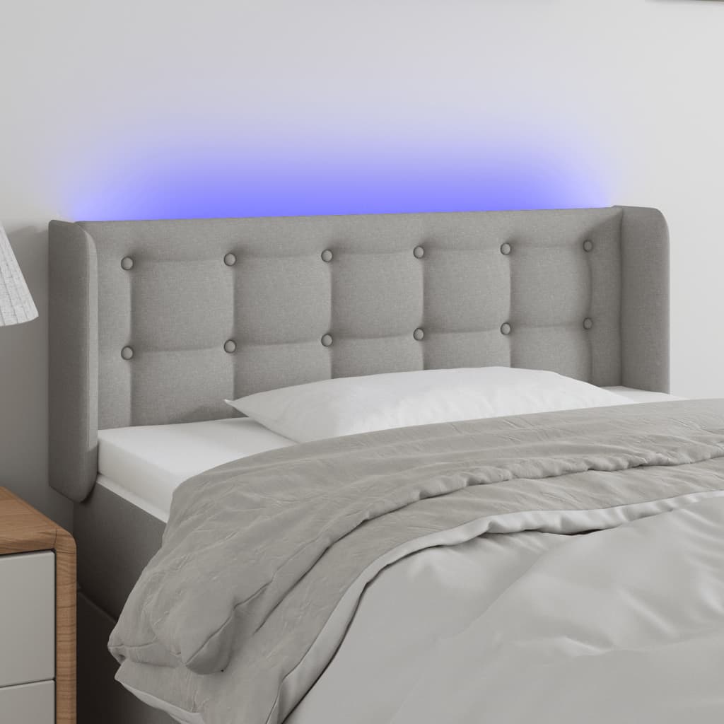 vidaXL Zagłówek do łóżka z LED, jasnoszary, 83x16x78/88 cm, tkanina